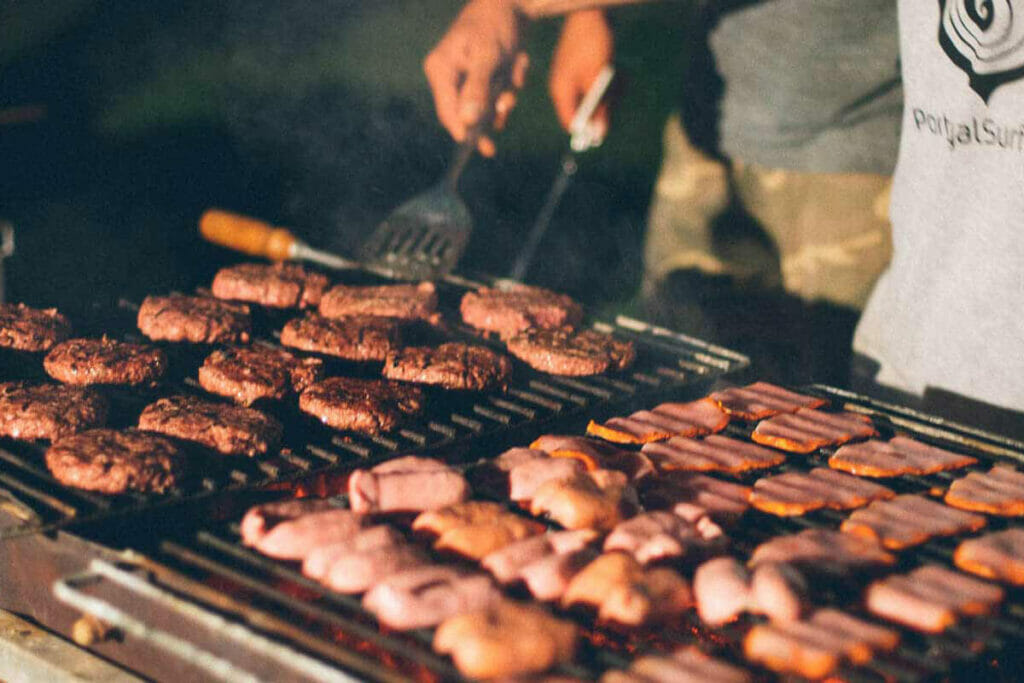 Griller topped with meat and sausage